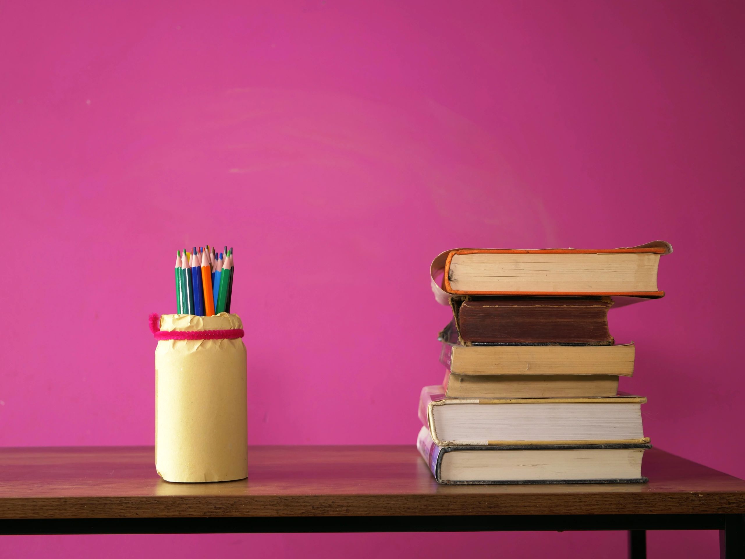 Books and pencils on a desk