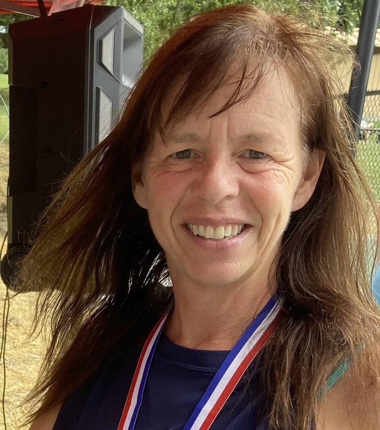 Cindy Butler smiling outdoors
